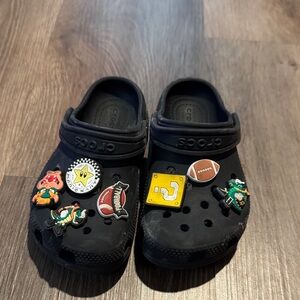 CROCS Black Clogs with Colorful Charms